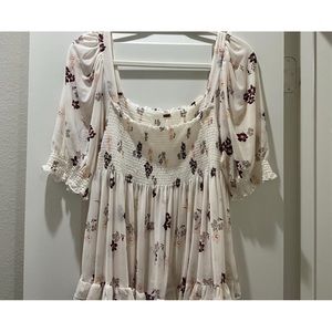 Off the shoulder (can be worn on shoulder) see through on the bottom half